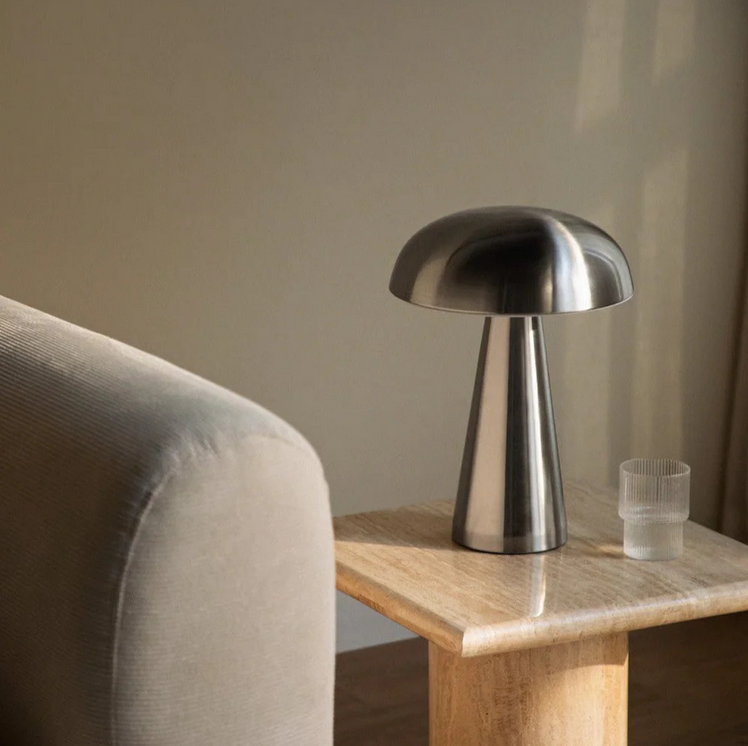 Brushed steel mushroom lamp styled on Kinfolk book minimalist beige decor