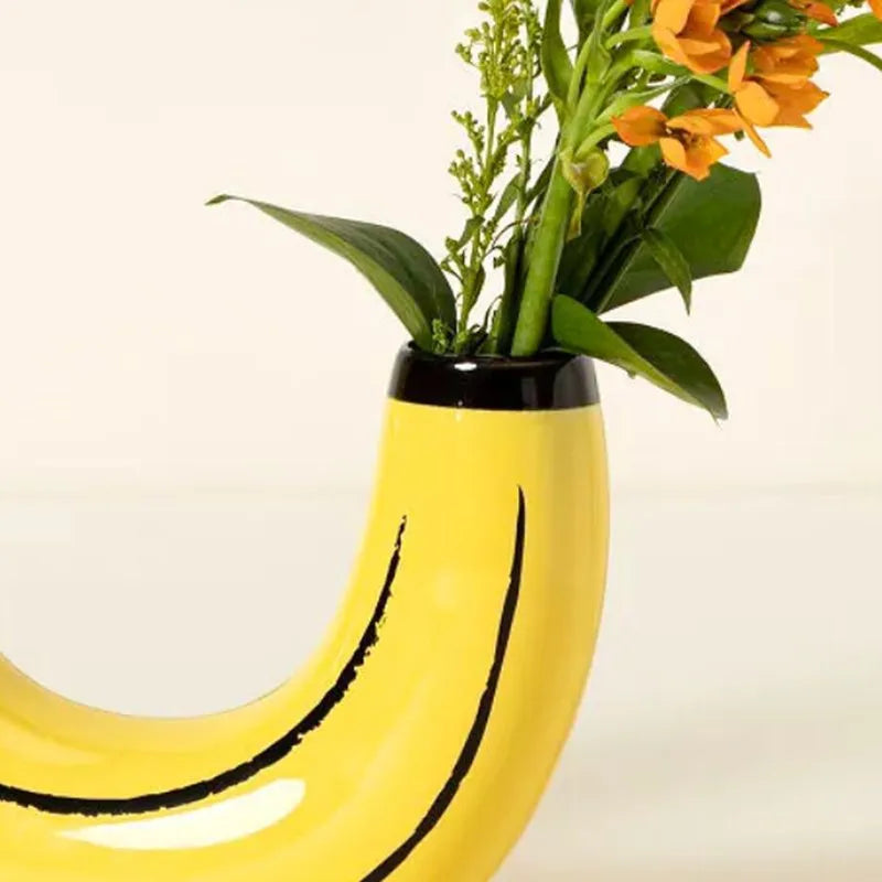 Yellow ceramic vase shaped like a banana pop art style home decor